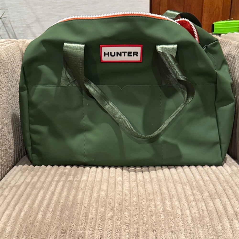Hunter Green Duffel Bag with Red Accents